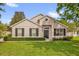Charming single-story home with manicured lawn, dark shutters, and neutral stucco exterior at 530 Hiawatha Palm Pl, Apopka, FL 32712