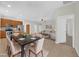 Inviting living space featuring an open floor plan between kitchen and dining area at 530 Hiawatha Palm Pl, Apopka, FL 32712