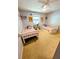 ' bedroom with two twin beds, shelving, and carpeted floors at 600 Lake St, Fruitland Park, FL 34731