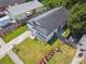 An aerial view of the house featuring a well manicured yard and partial fencing at 6148 Landrace Ln, Orlando, FL 32807