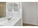 Bathroom vanity featuring a white sink and vanity at 6148 Landrace Ln, Orlando, FL 32807