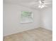 Bedroom featuring tile floors and a ceiling fan at 6148 Landrace Ln, Orlando, FL 32807