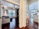 Bright living room featuring hardwood floors, a ceiling fan, a white sofa, and shutters at 616 Nadina Pl, Celebration, FL 34747