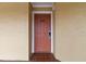 A cozy condo with a terracotta-colored door, a digital lock and matching tile entryway at 6402 Parc Corniche Dr # 5304, Orlando, FL 32821
