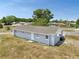 Charming single-story home with a well-maintained roof and lovely, fenced yard for privacy at 7 Garvey Ln, Frostproof, FL 33843