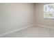 Bedroom with natural light and neutral colors offering a serene and adaptable living space at 741 Orange Ave, Longwood, FL 32750