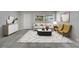 Bright and inviting living room with modern decor, neutral tones, and ample natural light at 75 Garrison Ln, Frostproof, FL 33843