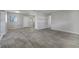 Expansive living area with abundant natural light, perfect for entertaining and relaxation at 75 Garrison Ln, Frostproof, FL 33843