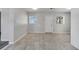 Bright and airy living space with multiple windows, enhancing the neutral wall and floor tones at 75 Garrison Ln, Frostproof, FL 33843