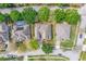 A detailed aerial view of the home showcases its landscaping, roof, and neighborhood surroundings at 902 Hire Cir, Ocoee, FL 34761