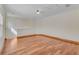 Bright bedroom features hardwood floors, neutral walls, and natural light at 902 Hire Cir, Ocoee, FL 34761