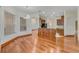 Dining area with hardwood floors, modern lighting, and views into the kitchen at 902 Hire Cir, Ocoee, FL 34761