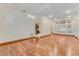 Spacious living room features hardwood floors, modern lighting, and an open floor plan at 902 Hire Cir, Ocoee, FL 34761