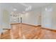 Bright living room with hardwood floors, recessed lighting, and arched doorways at 902 Hire Cir, Ocoee, FL 34761