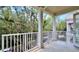 Inviting balcony with sturdy railings and ceiling fan provides a serene outdoor living space at 921 Begonia Rd # 302, Celebration, FL 34747
