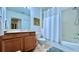 Clean bathroom with vanity, toilet, and shower-tub combination at 921 Begonia Rd # 302, Celebration, FL 34747