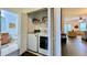 Laundry closet equipped with washer, dryer, and shelving for storage at 921 Begonia Rd # 302, Celebration, FL 34747