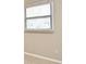 The interior of a vacant bedroom with a tile floor and natural light from the window at 994 Lormann Cir, Longwood, FL 32750