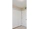 Spacious bedroom featuring closet with paneled doors and tile flooring at 994 Lormann Cir, Longwood, FL 32750