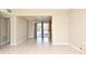 Bright, open room with tile flooring and sliding glass doors leading to the backyard at 994 Lormann Cir, Longwood, FL 32750