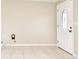 Bright entryway with a decorative door, tile floors, and neutral wall colors at 994 Lormann Cir, Longwood, FL 32750