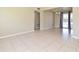 Bright living room with tile floors, neutral walls, and sliding glass doors to the outside at 994 Lormann Cir, Longwood, FL 32750