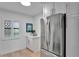 Stylish kitchen featuring updated appliances and ample natural light from the window at 100 S Interlachen Ave # 410F, Winter Park, FL 32789