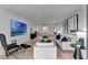 Spacious and contemporary living room with stylish decor and ample seating for entertaining at 100 S Interlachen Ave # 410F, Winter Park, FL 32789