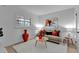 Cozy living room featuring a decorative vase, plush seating, and hardwood floors at 100 S Interlachen Ave # 410F, Winter Park, FL 32789