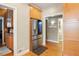 Gourmet kitchen with stainless steel refrigerator and hardwood floors offering style and functionality at 1002 Lake Elbert Se Dr, Winter Haven, FL 33880