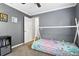 Bright bedroom features neutral walls, and carpeted floors at 10049 Custer Cir, Orlando, FL 32817