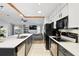 Bright kitchen with stainless steel appliances and a large island, perfect for cooking and entertaining at 10049 Custer Cir, Orlando, FL 32817