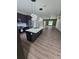 Modern kitchen featuring a large island, stainless steel appliances, and pendant lighting in an open floor plan at 1005 Randall St, Orlando, FL 32805