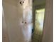 Bathroom featuring a shower stall and a view of the adjoining areas at 1108 Bear Lake Rd, Apopka, FL 32703