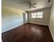 Bedroom featuring hardwood floors, a ceiling fan, and a window for natural light at 1108 Bear Lake Rd, Apopka, FL 32703