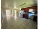 Large kitchen with stainless steel appliances and plenty of counter space at 1108 Bear Lake Rd, Apopka, FL 32703