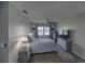 Serene bedroom with plush carpet, a ceiling fan, and matching bedside lamps at 11137 Acme Dr # 207A, Orlando, FL 32825