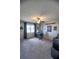 Versatile bedroom with carpet, a ceiling fan, and ample space for a home office at 11137 Acme Dr # 207A, Orlando, FL 32825