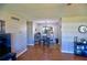 Cozy dining area featuring a round table, stylish chairs, and modern decor at 11137 Acme Dr # 207A, Orlando, FL 32825