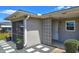 Close-up exterior shot featuring a decorative breezeway and freshly landscaped entrance at 11137 Acme Dr # 207A, Orlando, FL 32825