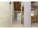 Large living room ready for renovation with ceramic floors and sliding glass doors to the backyard at 12102 Sandal Creek Way, Orlando, FL 32824