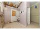 Renovation ready room with open doorway to another room and exterior door at 12102 Sandal Creek Way, Orlando, FL 32824