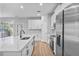 Spacious kitchen with modern appliances, island and access to the backyard at 13312 Sw 41St Ct, Ocala, FL 34473