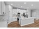 Bright kitchen showcasing ample counter space, an island and stainless steel appliances at 13312 Sw 41St Ct, Ocala, FL 34473