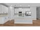 A beautifully appointed kitchen featuring a large center island and stainless steel appliances at 13312 Sw 41St Ct, Ocala, FL 34473