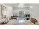 Stylish kitchen with granite countertops, white cabinets and modern appliances at 1333 Villa Ln # 47, Apopka, FL 32712