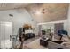 Spacious living room with vaulted ceiling, hardwood floors and modern accents at 1333 Villa Ln # 47, Apopka, FL 32712