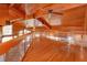 Upstairs loft boasting natural light, wood floors, and wood ceilings at 13377 Lake Butler Blvd, Winter Garden, FL 34787
