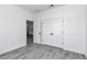 A large bedroom featuring an adjoining doorway and closet at 13430 Sw 88Th Ter, Ocala, FL 34473