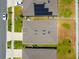 Aerial view of a home with a well-maintained roof and a large, grassy backyard at 1535 Barberry Dr, Kissimmee, FL 34744